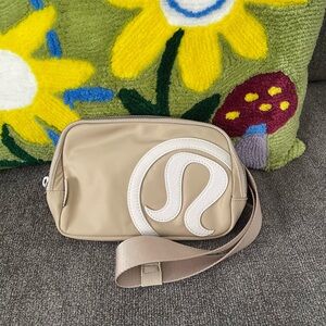 Lululemon Athletica Tan and White Crossbody Bag with Minimalist Design